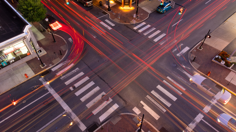 Intersection at night with traffic lights 