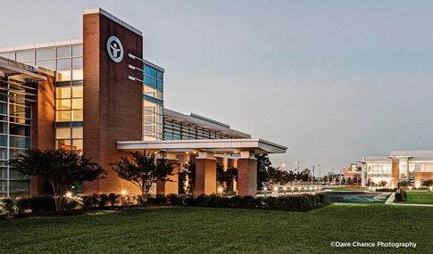 Twilight view of the LifeNet Health campus.