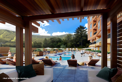 People lounge by the pool at the Aquatics Terrace at One Spruce Peak