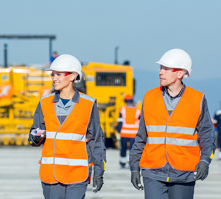 two engineers at airport runway