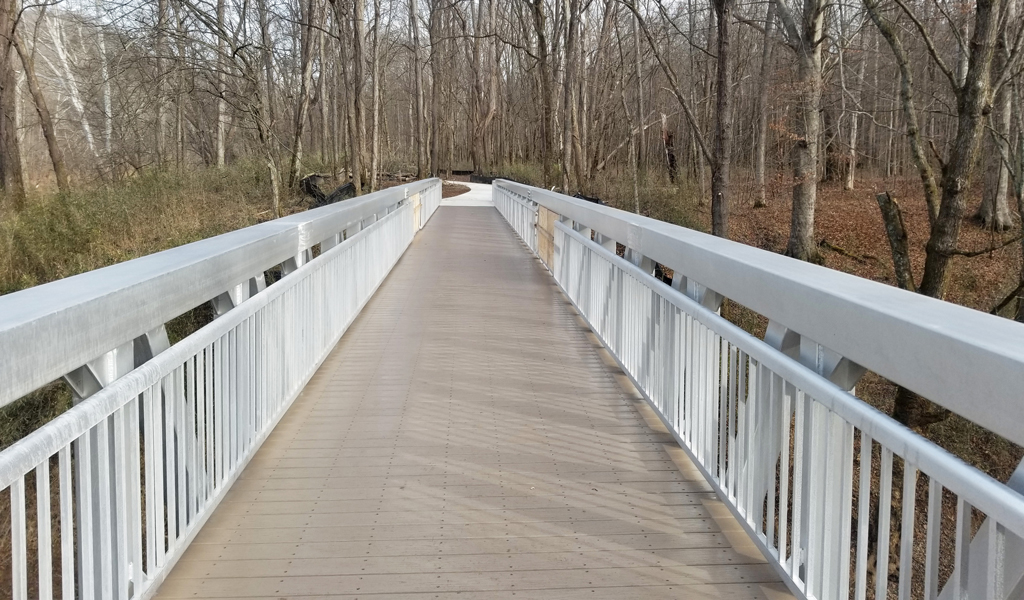 : View of the accessible trail that connects to the newly constructed pedestrian bridge.